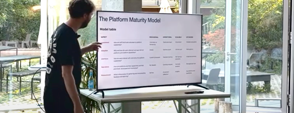 Dominik Kress at the Berlin Pulumi Group meetup explaining the platform maturity model